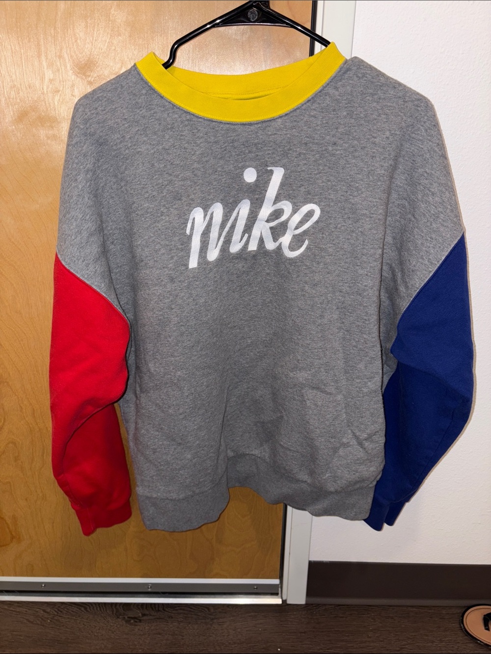 Nike Gray Crewneck Sweater with Red and Blue Sleeves and Yellow Collar